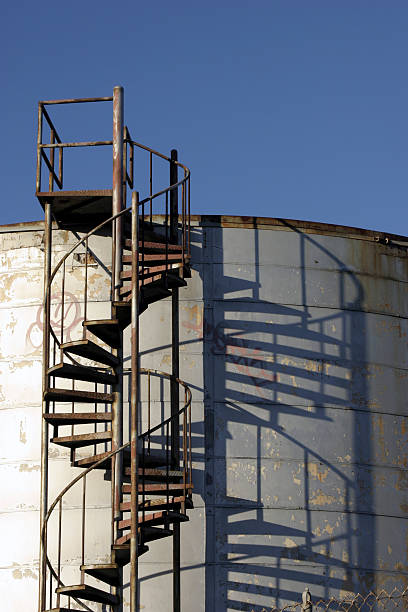 spiral stairs at silo  / tank - industrial stock photo