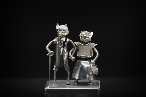 Anthropomorphic cat elderly couple metal figures