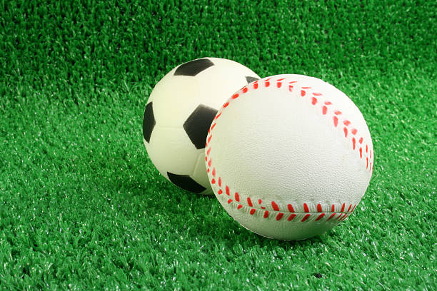 istock baseball and soccer ball 182180370