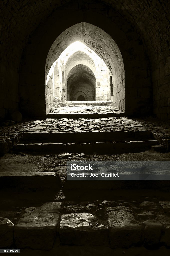 Inside Krak des Chevaliers crusader castle in Syria Interior passage at Crac des Chevaliers, a well preserved Crusader fortress in Syria Antiquities Stock Photo