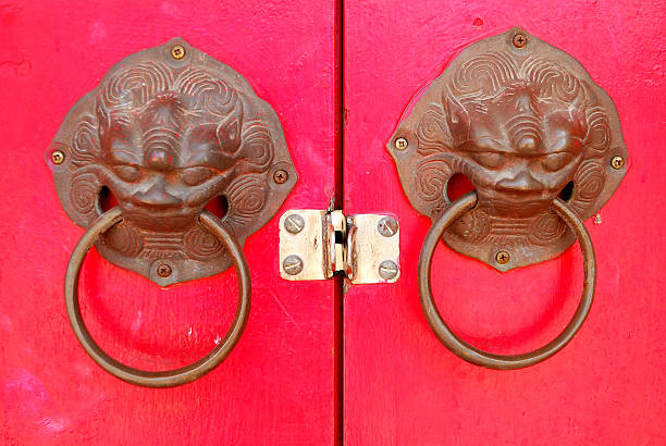 istock knocker on China doors 182180836