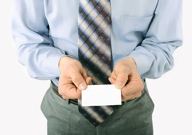Business man handing a blank business card (Asian Tradition)