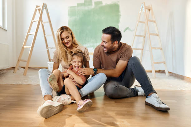 istock Cheerful family having fun during home renovation process. 1821818209