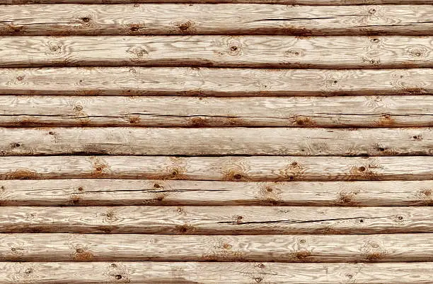 Photo of Seamlessly tiling wooden log wall.