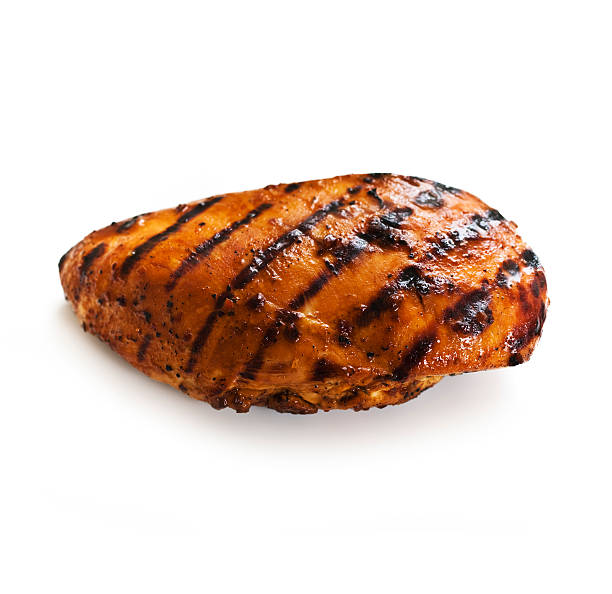 Grilled Chicken "Grilled Chicken breast, isolated on white. Selective focus.SEE MY PORTFOLIO FOR MANY VARIATIONS AND FOOD IMAGES." grilled chicken breast stock pictures, royalty-free photos & images