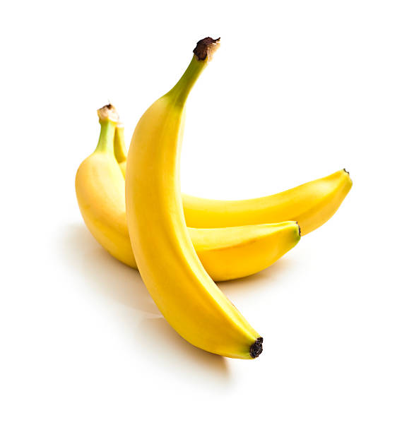 Close up of three fresh bananas on a white background