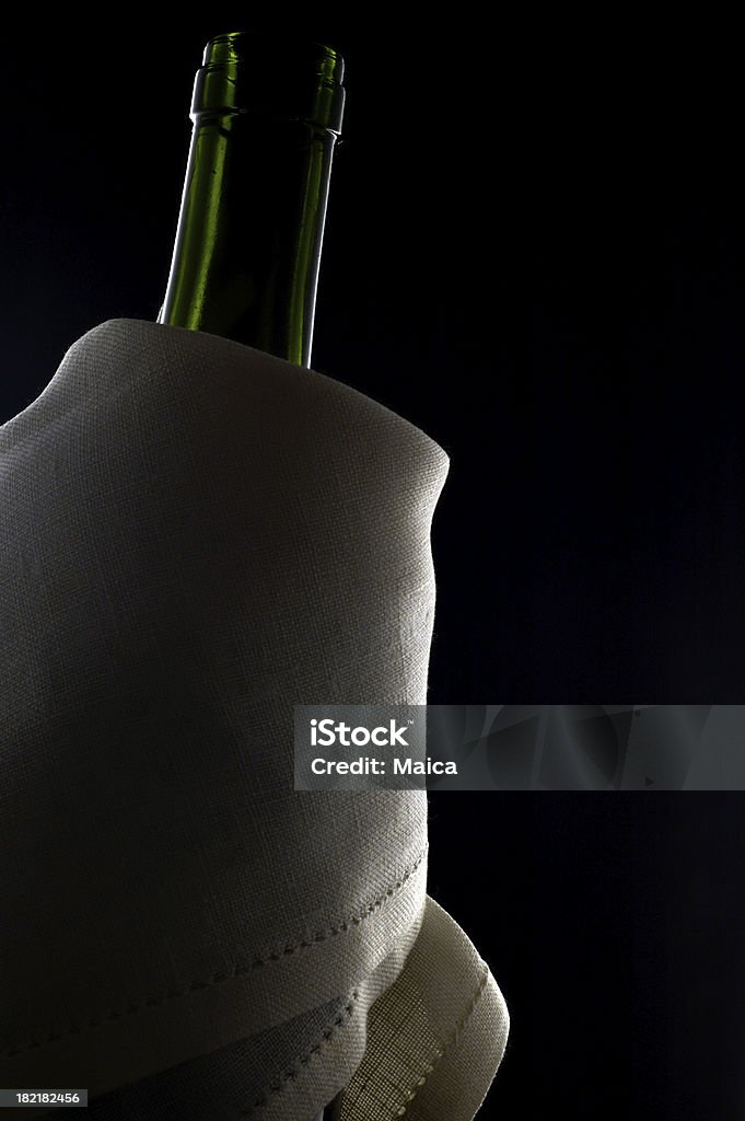 Ready to serve. Bottle neck and napkin. Abstract Stock Photo