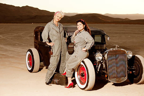 Retro pinup girls in mechanic's coveralls by a classic car Retro pinup girls in mechanic's coveralls by a classic car. You might also be interested in these: 40s pin up girls stock pictures, royalty-free photos & images
