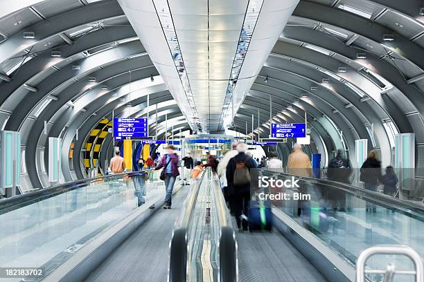 Travellers On Moving Walkway At Airport Stock Photo - Download Image Now - Airport, Frankfurt - Main, People