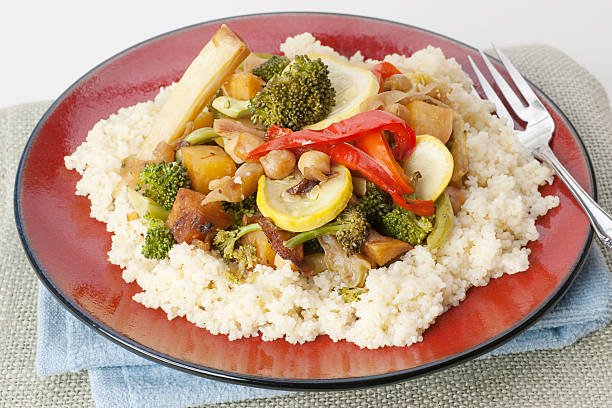 istock vegetarian dish - couscous with vegetable stir fry 182183747