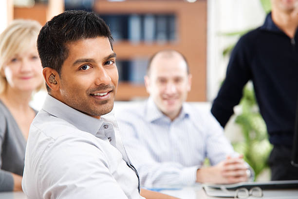 A group of people in business casual dress stock photo