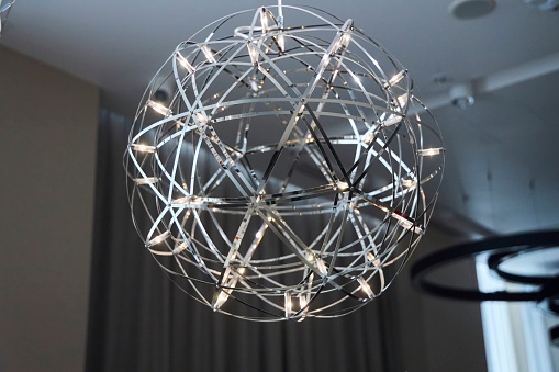 LED ceiling chandelier. Modern technology for a smart home