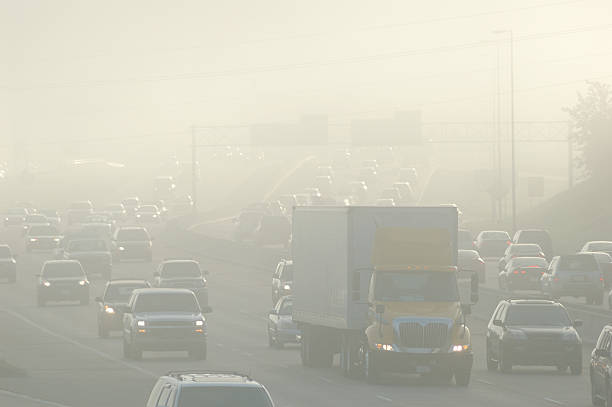 Rush Hour Smog Rush hour traffic with smog.related: smog car stock pictures, royalty-free photos & images