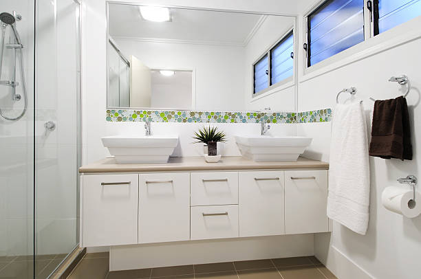 Modern apartment bathroom Modern bathroom in Australian appartment. powder room stock pictures, royalty-free photos & images