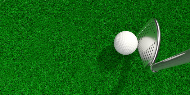 Golf ball and artificial grass on the white background.