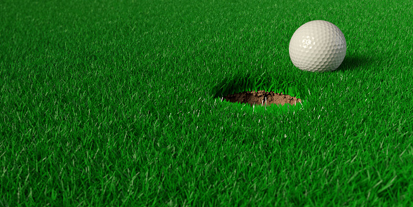 The golf ball is right in front of the hole.The score is guaranteed. Large copy space on green grass. 3D rendered objects and clear, simple design.
