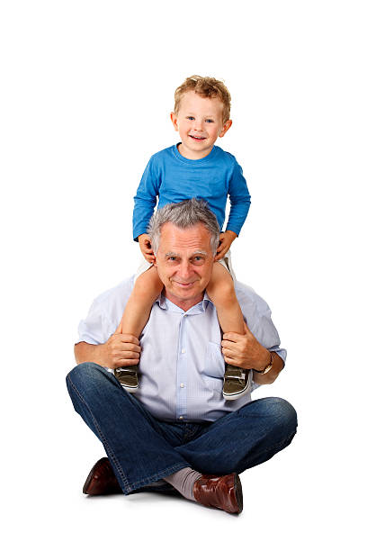 Father and son enjoying a carefree summer day outdoors.