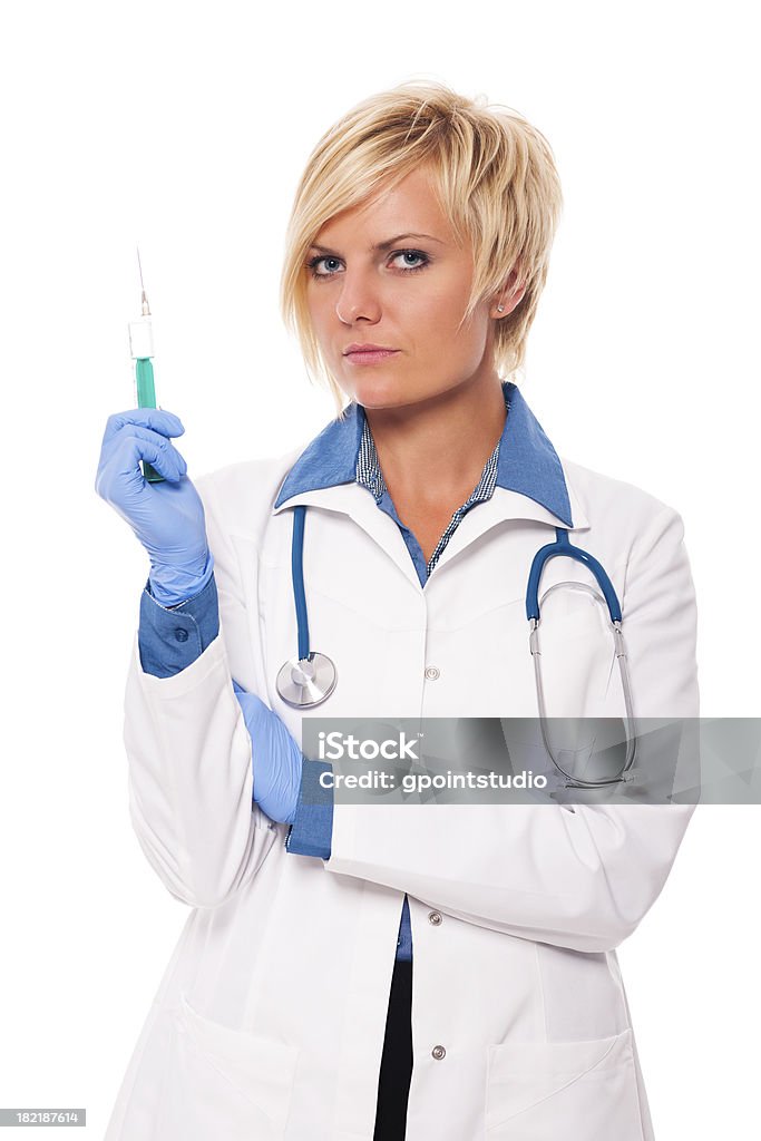 深刻な女性医師は、造影剤注入の準備をする - 1人のロイヤリティフリーストックフォト