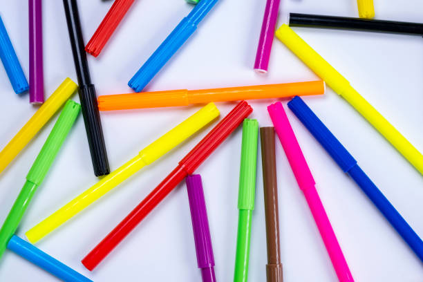 istock Multicolored felt-tip pens or markers close-up on a white background, the concept of creativity,creativity and education 1821876254