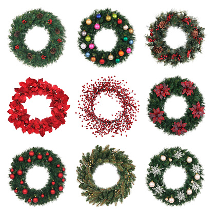 Christmas corner arrangements with pine twigs and poinsettia flower isolated on white background