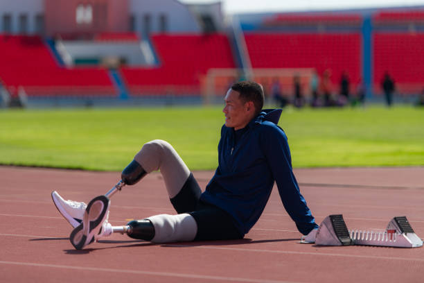 istock Athletes with disabilities take a break at the stadium between training sessions. 1821877375