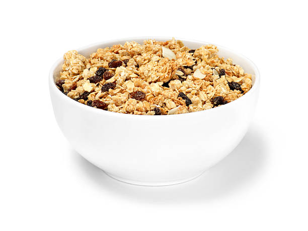 изюм & миндаль завтрак мюсли мюсли - bowl cereal cereal plant granola стоковые фото и изображения