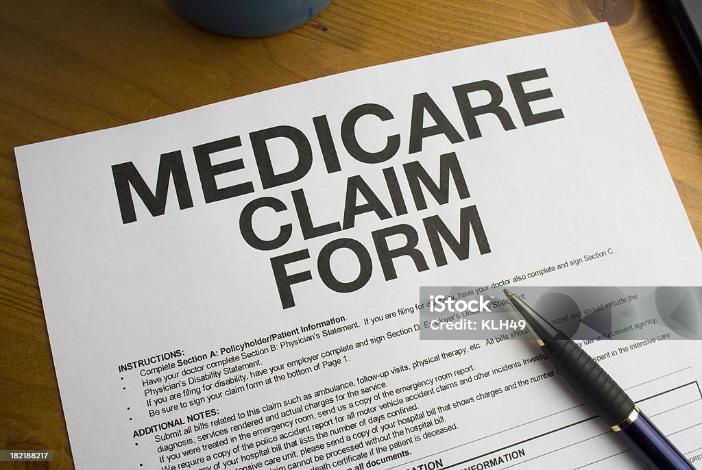 Medicare modulo di richiesta. - Foto stock royalty-free di Modulo di richiesta di risarcimento