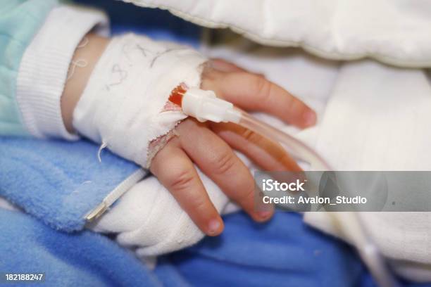 Childs Hand Connected A Drip Stock Photo - Download Image Now - Baby - Human Age, Baby Boys, Blood