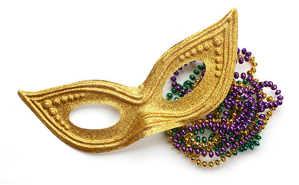 Mardi Gras Beads and Gold Mask on white backgound