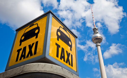 Taxi sign and Television Tower. Berlin. Germany.