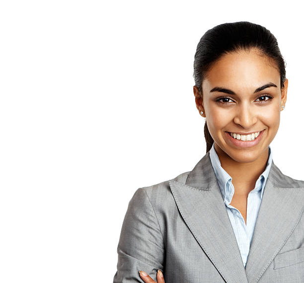 istock A smartly dressed young woman is smiling at the camera  182188396