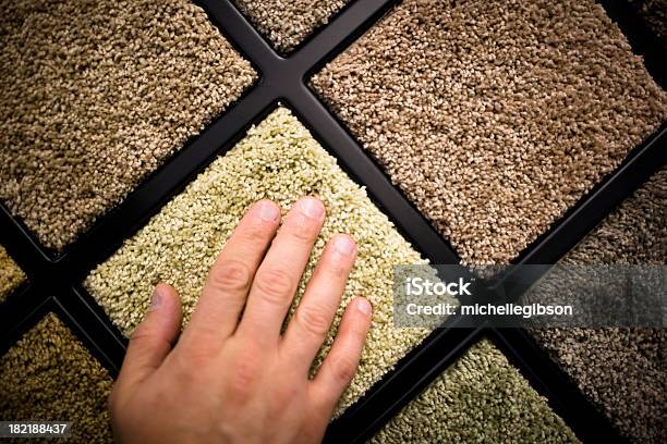 Closeup Of Mans Hand Feeling Carpet Samples Stock Photo - Download Image Now - Carpet Sample, Choosing, Carpet - Decor