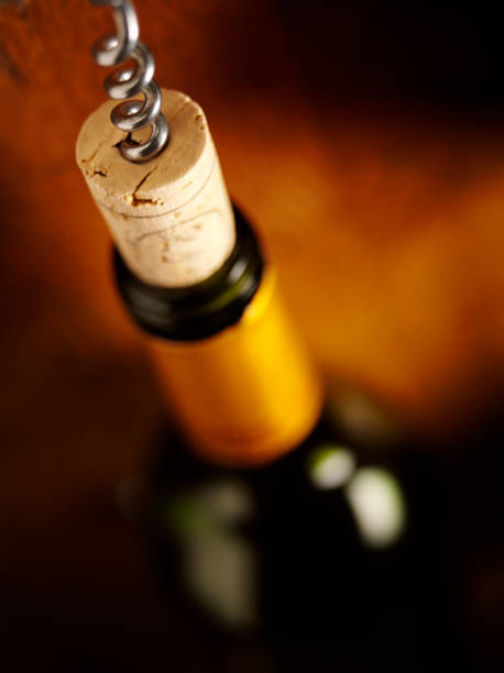 istock Opening a Bottle of Wine 182188490