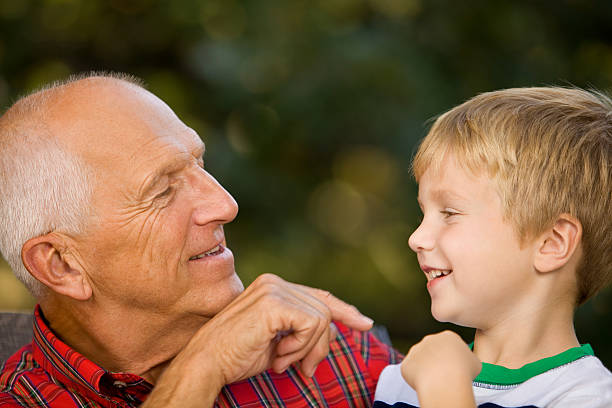 istock Grandfather Entertaining Grandson 182188556