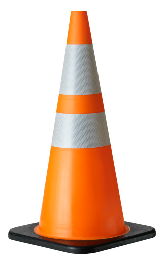 Bright orange construction of traffic cone with reflective stripes. Isolated on white background.Studio shot with medium format camera and digital back.