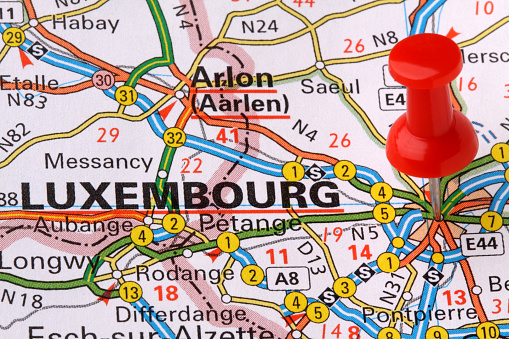 A red pushpin on a map pointing to Luxembourg.