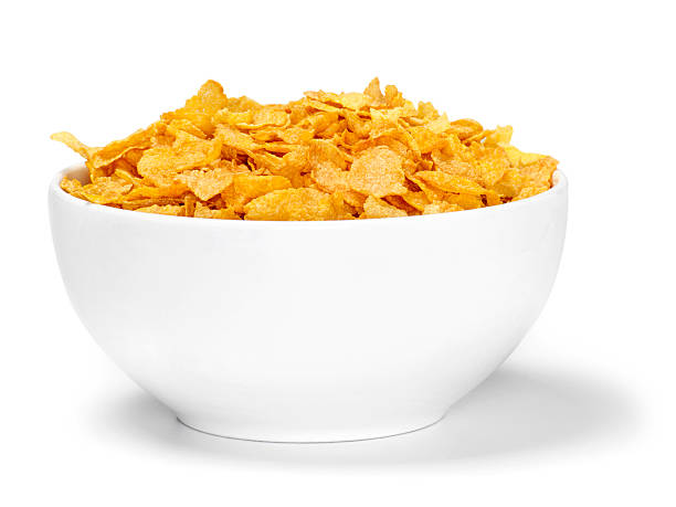 Corn Flaked Breakfast Cereal Corn Flaked Breakfast Cereal-Photographed on Hasselblad H1-22mb Camera breakfast cereal photos stock pictures, royalty-free photos & images