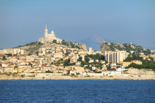 Marseille - the second-largest city of France seen from the sea. The basilica Notre-Dame de la Garde (the highest point) is a major landmark.