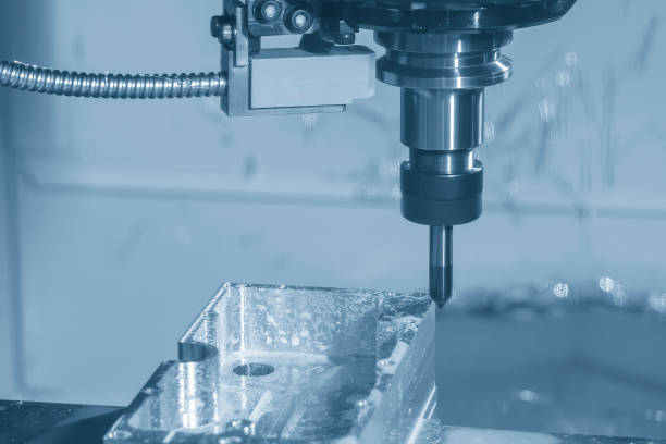 istock The CNC milling machine chamfer cutting mold base part by chamfer tool in the light blue scene. 1821903502