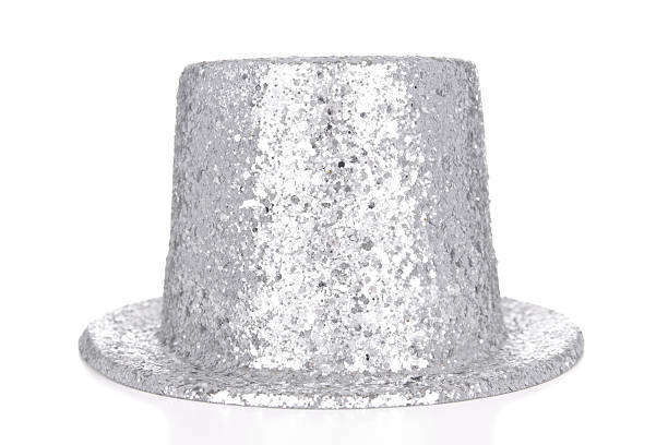 Silver glitter top hat on white background stock photo