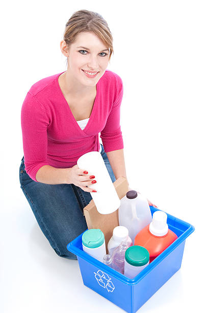 istock Young Woman Recycling Series 182191535