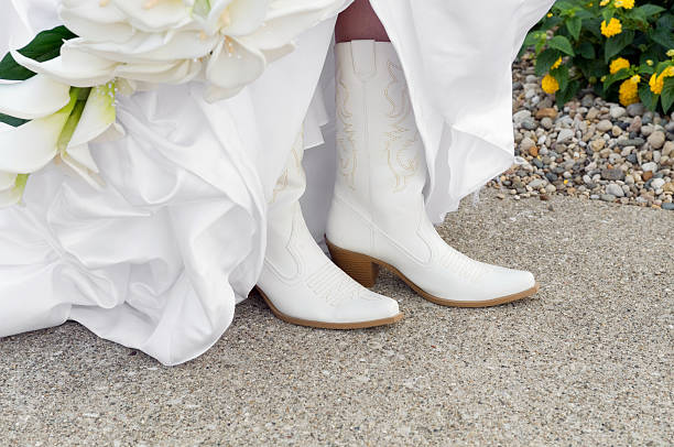 Bride in Cowboy Boots stock photo