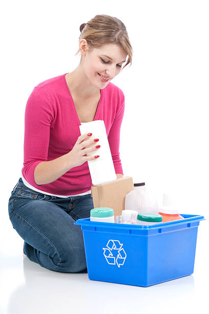 istock Young Woman Recycling Series 182191924