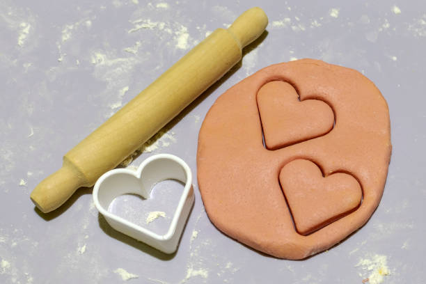 istock Dough and heart shaped cookie cutter 1821919893