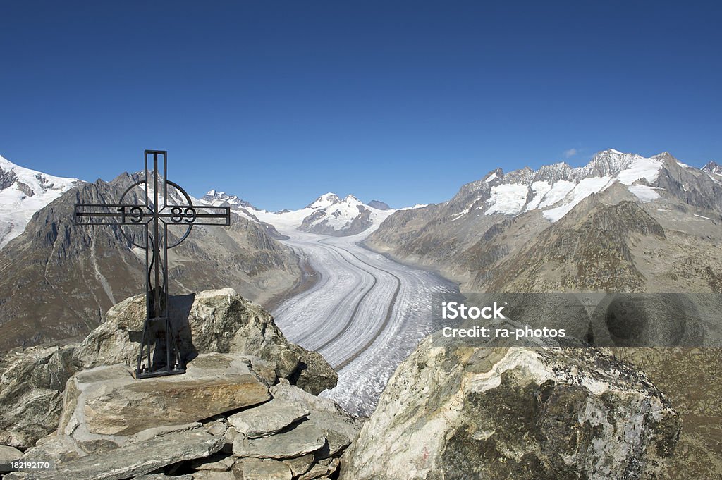 View on the Aletsch Glacier View on the Aletsch Glacier (Switzerland) from the Eggishorn mountain peak Summit Cross Stock Photo