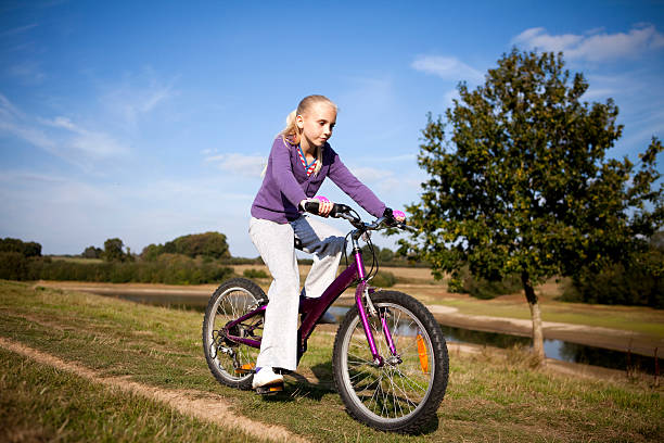 istock Girl Cycling in Countryside 182192407