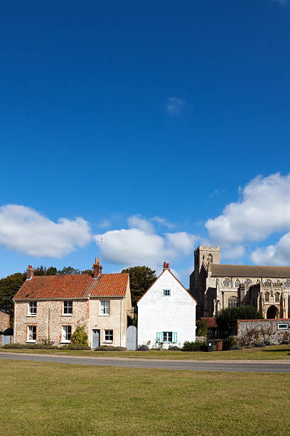 istock Cley next the Sea church and village green 182192592