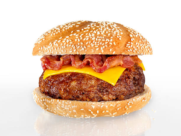 Bacon Cheeseburger Bacon Cheeseburger with Natural Shadow and Gradation-Photographed on Hasselblad H3D-39mb Camera bacon cheeseburger stock pictures, royalty-free photos & images