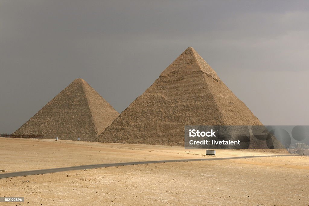 Egyptian Pyramids under Stormy grey sky Egyptian Pyramids under dark grey stormy sky Africa Stock Photo