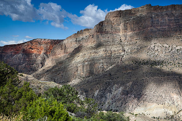 istock Classic Western Mountainous Landscape, Cliff, Cloud, Shadows, Green, Blue Sky 182193674